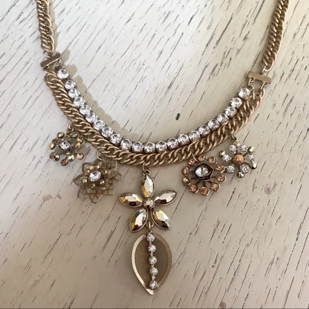 Gold Tone Necklace with Rhinestones and Flower Charms